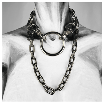 FROSTGLANZ brutalist necklace featuring central stainless steel ring held by two carabiners, flanked by a detachable chain and finished with a reclaimed leather neckpiece — shown on mannequin, handcrafted by skinpressedtight