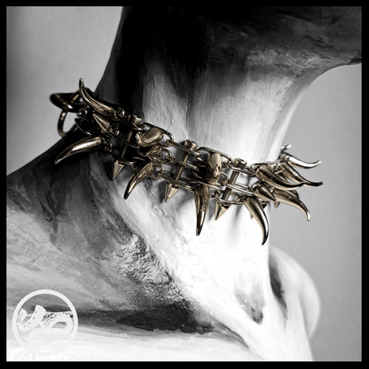 QUERULANT choker necklace made of reclaimed leather and metal hardware, displayed on mannequin — edgy, handcrafted gothic accessory.