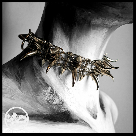 QUERULANT choker necklace made of reclaimed leather and metal hardware, displayed on mannequin — edgy, handcrafted gothic accessory.