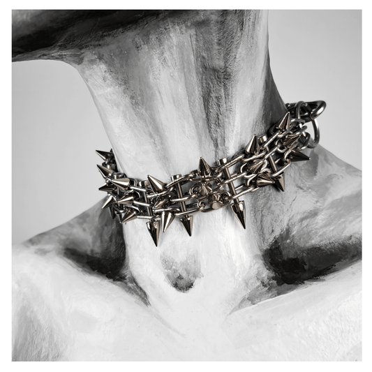 STOERENFRIED choker necklace made of reclaimed leather and metal hardware, displayed on mannequin — edgy, handcrafted gothic accessory.