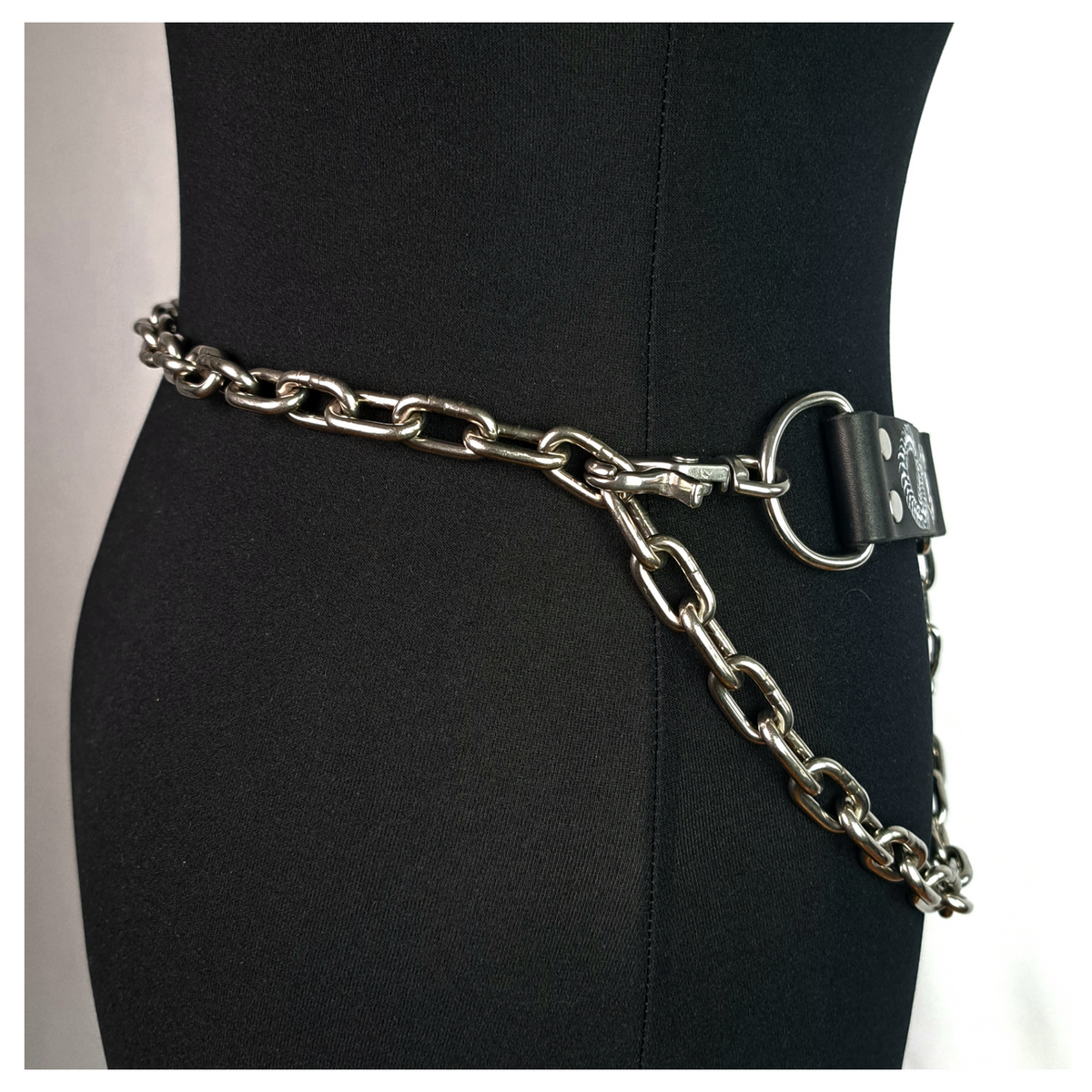 VIPERNZIRKEL – BONES chain belt on a dress form, side: heavy steel chain swagged round the hip from a snap hook. Handmade by skinpressedtight
